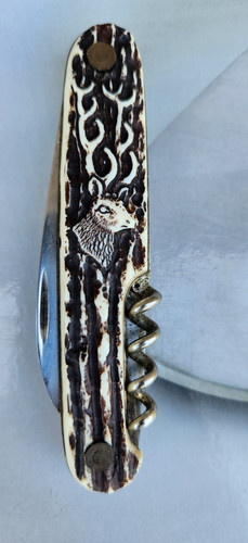 Coltello con manico - con,